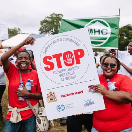 Women at a protest against violence and harassment in the workplace