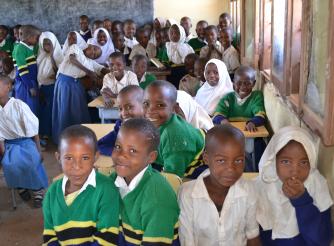 Photo of a group of schoolchildren in their classroom